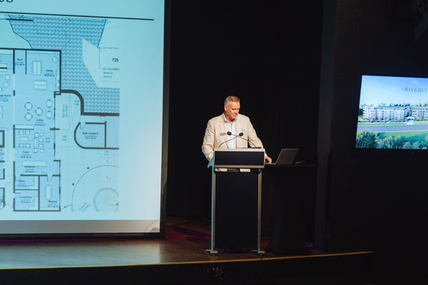 John Burgess, Managing Director (Vision), introducing the village